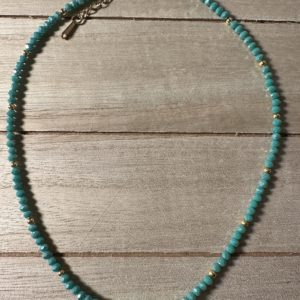 Green and gold with green ball charm