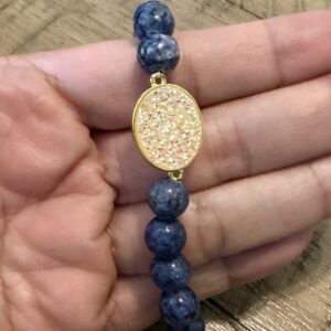 Denim blue with oval sparkly charm