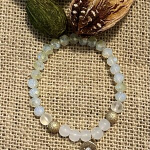 Clear beads with gold charm