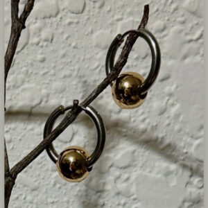 Stainless steel hoops with dangling ball charm