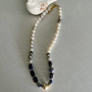 Grey and blue large beads with gold charm
